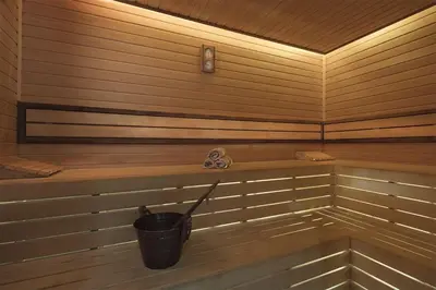 a sauna with a bucket in the middle of it at Holiday Inn Istanbul - Tuzla Bay by IHG in Istanbul