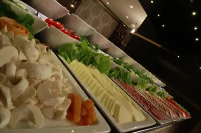 a refrigerator filled with lots of different types of food at Mirilayon Hotel - Old Town in Istanbul
