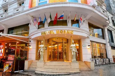 a hotel lobby with flags on the front of a building at Mosaic Hotel Old City -Special Category in Istanbul