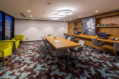 a conference room with a table and chairs at Hampton by Hilton Istanbul Kurtkoy in Istanbul