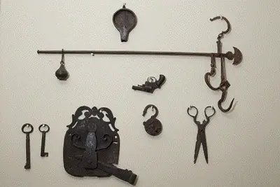 a group of tools hanging on a wall at Hotel Empress Zoe in Istanbul