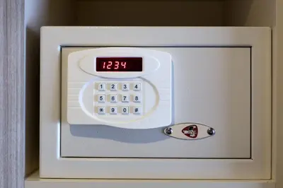a microwave oven with a digital clock on it at Regard Hotel in Istanbul