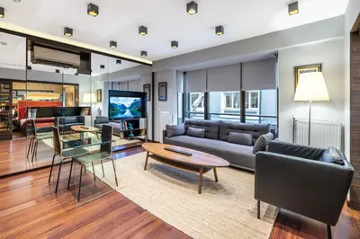 a living room with a couch and a table at Deger 16 Residences in Istanbul
