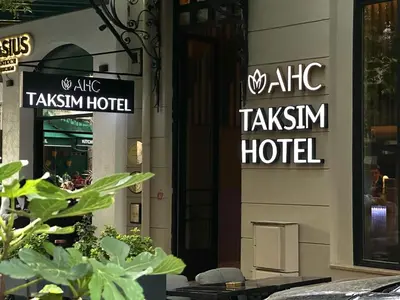 a hotel sign on the side of a building at AHC Taksim Hotel-Special Class in Istanbul