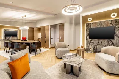 a living room with a couch and a table at AHC Taksim Hotel-Special Class in Istanbul