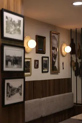 a waiting room with pictures on the wall at Hotel Evsen in Istanbul