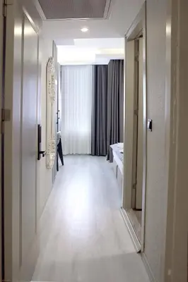 a hallway of a hotel room with a mirror at AMARA OLD CITY HOTEL & Spa in Istanbul