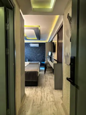 a hotel room with a bed and a desk at AMARA OLD CITY HOTEL & Spa in Istanbul