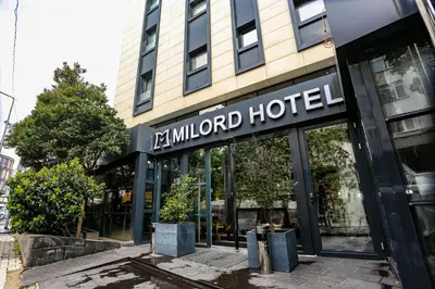 a hotel building with a sign on the front of it at Milord Hotel in Istanbul