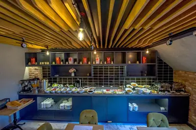 a room with a counter with aasteryasteryasteryasteryasteryasteryasteryasteryastery at Homelike Hotel in Istanbul