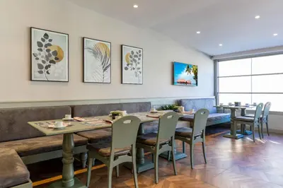 a dining room with a table and chairs at Hotel Genova Istanbul Old City in Istanbul