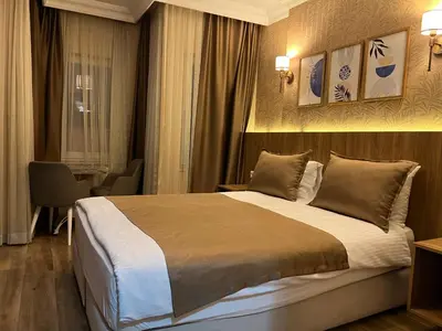 a bedroom with a large bed in a room at Sultanahmet inn Hotel in Istanbul