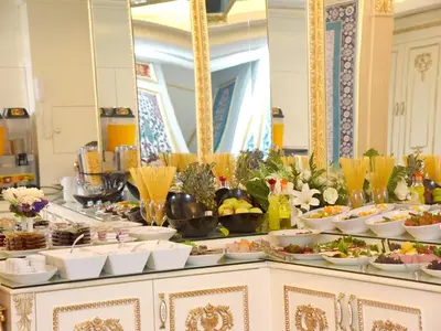 a buffet with a lot of food on a table at İstasyon Hotel in Istanbul