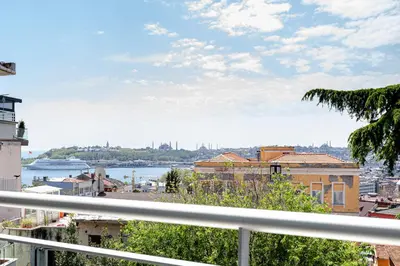 a balcony with a view of the water and buildings at NOA - Sungu 1 in Istanbul