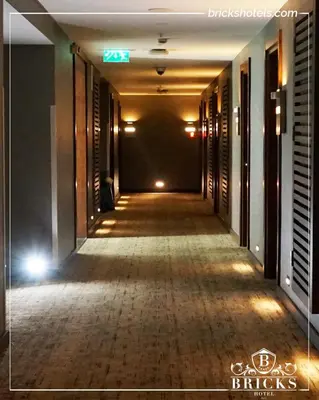 an empty corridor of a building with a long hallway at Bricks Hotel İstanbul in Istanbul