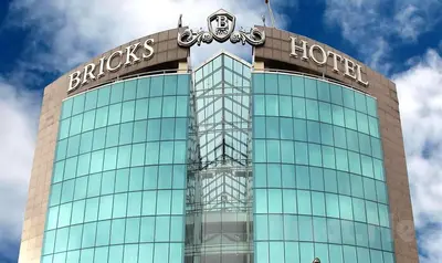 a building with a sign on the top of it at Bricks Hotel İstanbul in Istanbul