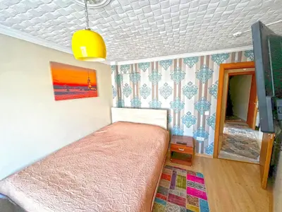 a small bedroom with a bed in a room at Green Life Apart Hotel in Istanbul