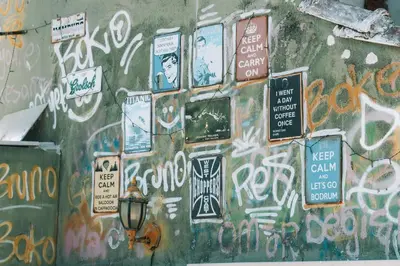 a wall with alot of graffiti on it at Green Life Apart Hotel in Istanbul