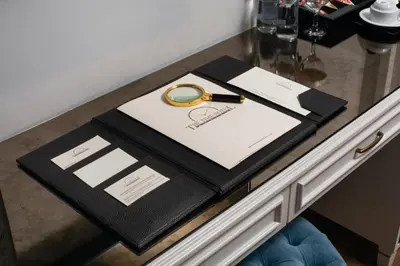 a table with a book and a pen on it at The Time Hotel Marina in Istanbul