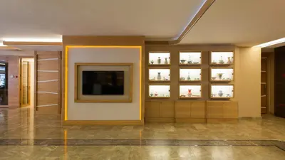 a lobby with a television in a building at Prestige Hotel Old City in Istanbul