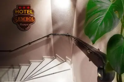 a set of stairs in a room with a plant at Sembol Hotel in Istanbul