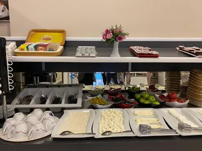 a shelf filled with different types of food at Magnaura House Hotel in Istanbul