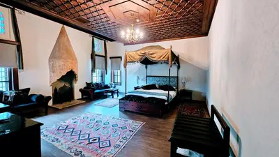a bedroom with a canopy bed in a room at Otantik Hotel & Spa in Bursa