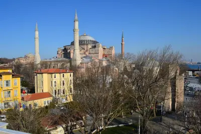 a view of a mosque with two smoke stacks at Ares Hotel in Istanbul