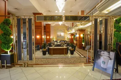 a lobby of a hotel with a waiting room at Akgun Istanbul Hotel, WorldHotels Elite in Istanbul