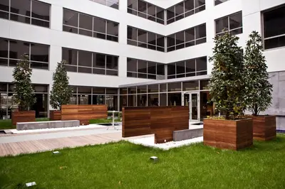 an office building with trees in front of it at ISG Sabiha Gökçen Airport Hotel in Istanbul
