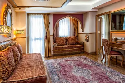 a living room with a couch and a table at Hotel Sultania Boutique Class in Istanbul