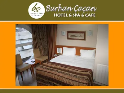 a hotel room with a bed and a desk at BC Burhan Cacan Hotel & Spa & Cafe in Istanbul