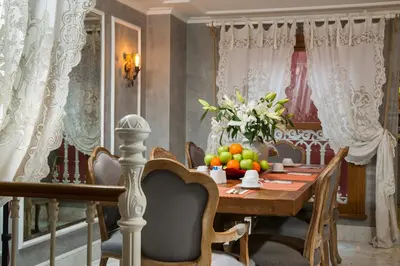 a dining room with a table with fruit on it at Amofta Hotel Taksim in Istanbul