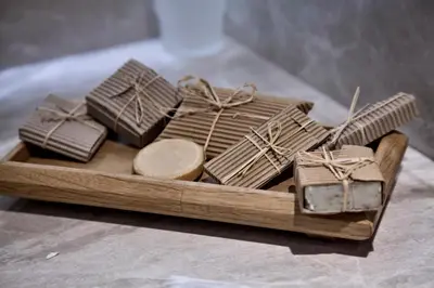 a wooden tray filled with chocolate presents on a table at Golden Age Hotel Taksim in Istanbul