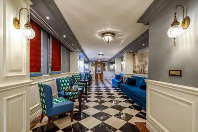 a row of chairs in a waiting room at Hagia Sofia Mansions Istanbul, Curio Collection by Hilton in Istanbul