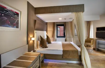 a hotel room with a bed and a television at Jazz Hotel Nisantasi in Istanbul