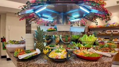 a buffet line with many different salads and food at İstanbul Trend Hotel Old City in Istanbul