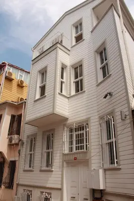 a white house with a white door at Jasmine Apart & Boutique Hotel in Istanbul