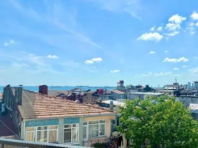 a view of a city with buildings and the ocean at Magnificent Hotel in Istanbul