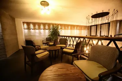 a restaurant with chairs and tables and a bar at Elibol Hotel Old City in Istanbul