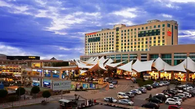 a city with cars parked in a parking lot with buildings at Crowne Plaza Istanbul Asia by IHG in Istanbul