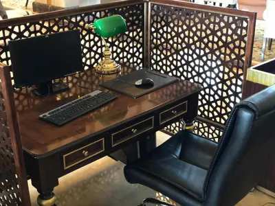 a desk with a computer monitor and a chair at Crowne Plaza Istanbul Asia by IHG in Istanbul