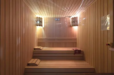 a sauna with a tub with lights in it at Crowne Plaza Istanbul Asia by IHG in Istanbul