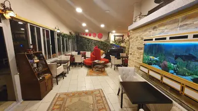 a restaurant with a large aquarium in a room at Sultanahmet Park Hotel in Istanbul