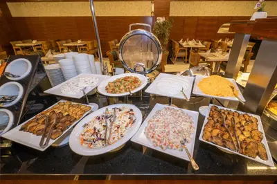 a buffet with many different types of food on a table at Grand S Hotel in Istanbul