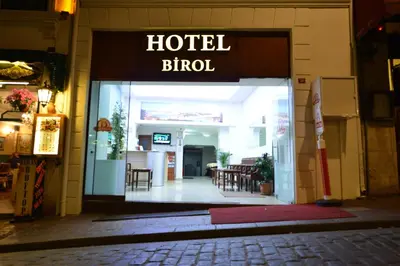 an open door to a hotel bilt sign on a building at Birol Hotel in Istanbul
