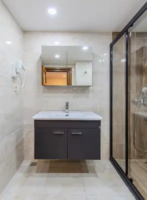 a bathroom with a sink and a shower at Hotel Silviya in Istanbul