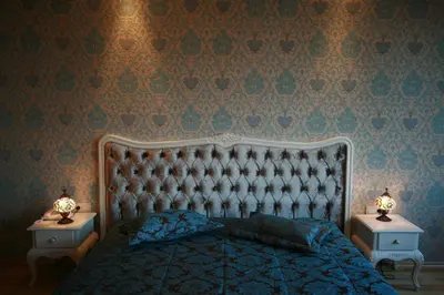a bedroom with a bed and two night stands with lamps at Esans Hotel - Special Category in Istanbul