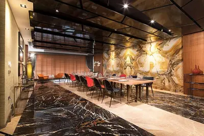 a dining room with a long table and chairs at DoubleTree By Hilton Istanbul - Old Town in Istanbul