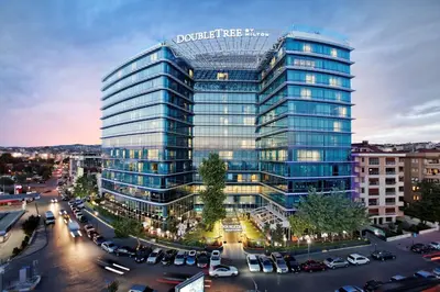 a rendering of a tall blue office building at DoubleTree By Hilton Istanbul - Moda in Istanbul